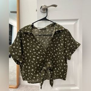 Green coin on button up with tie